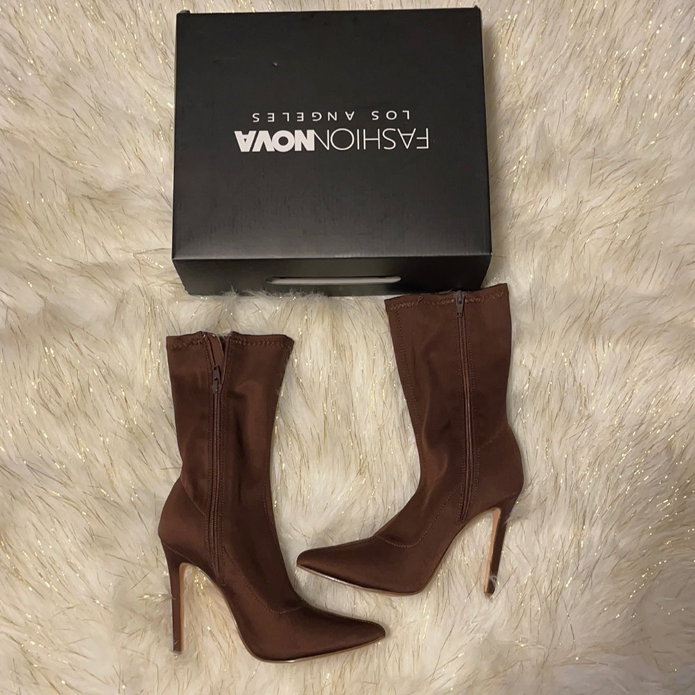 High heel booties. Brand new. Never been worn.